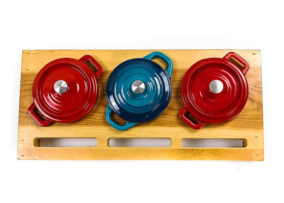 Van het het Gietijzerkamp van de emaildeklaag de Oven 3pcs voor het Kamperen Brand wordt geplaatst die